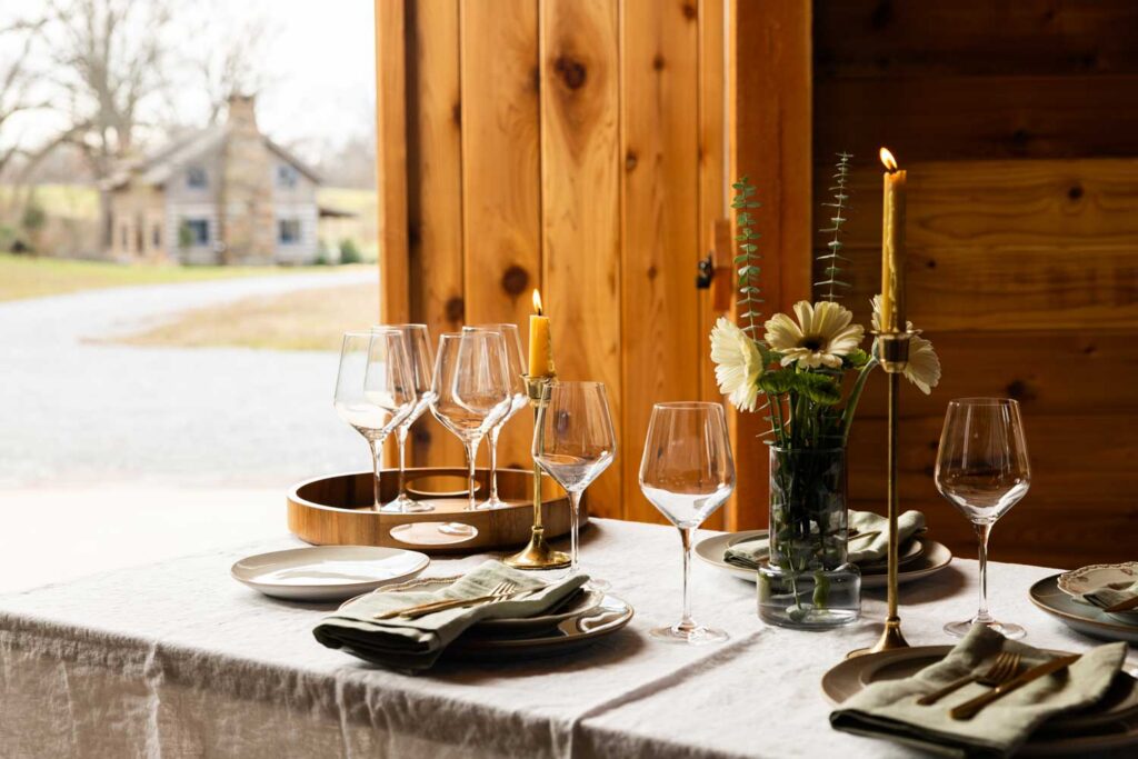 the_farm_2026_website_barn_table_setting