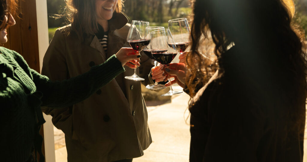 the_farm_2026_website_barn_wine_cheers