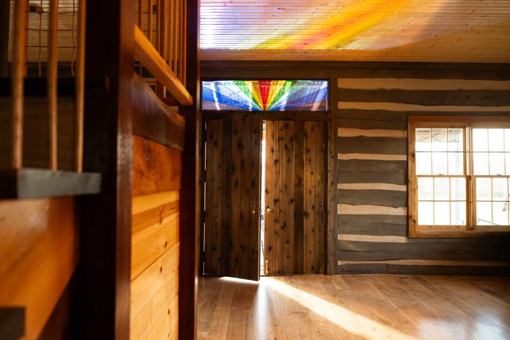 the_farm_2026_website_cabin_stained_glass_edit
